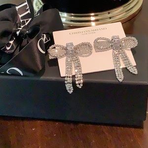 Christian Siriano elegant CZ bow earrings.  Approximately 1 & 1/2 inches long.